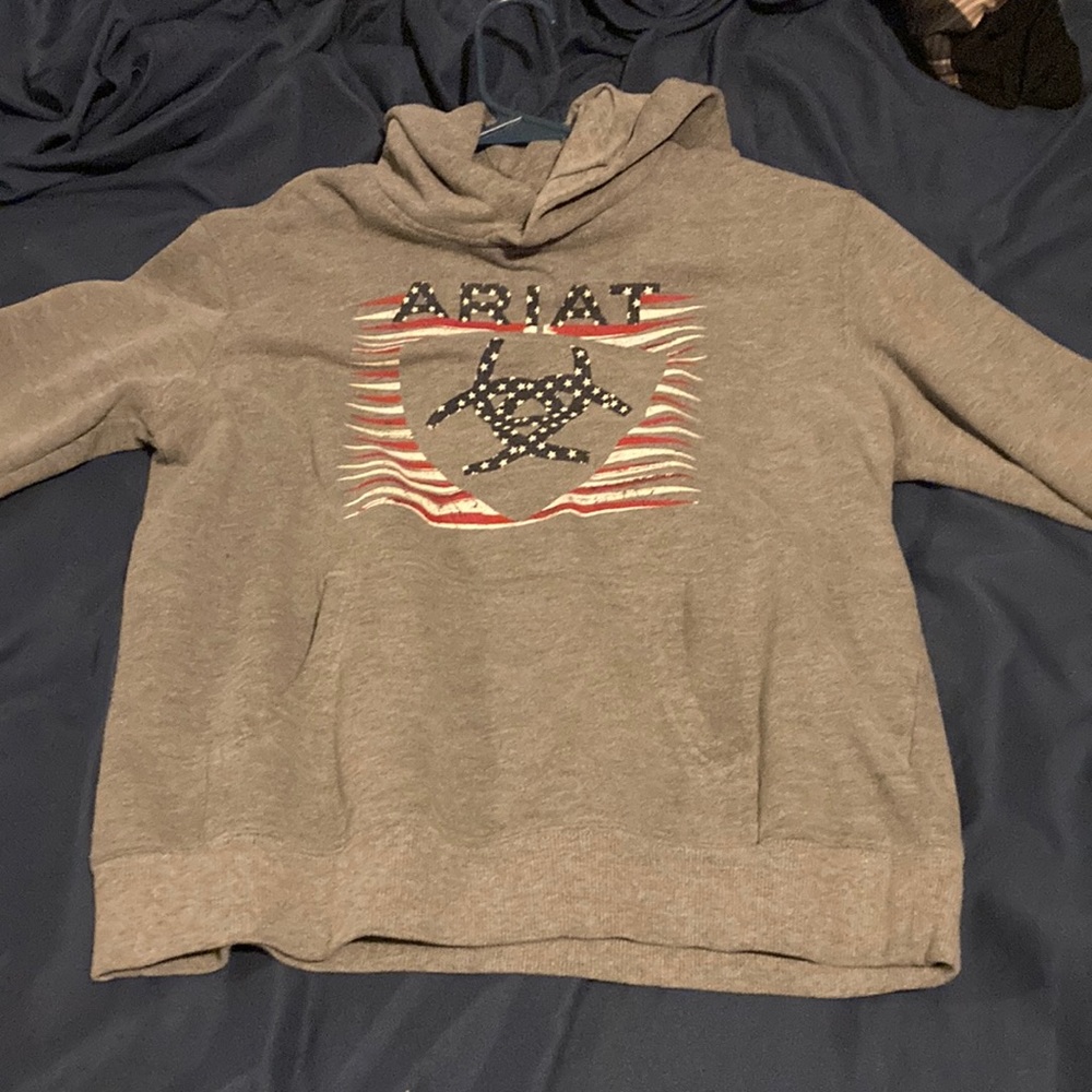 I am selling a sweatshirt it is a boys large the brand is ariat American flag